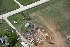 Two days after a tornado hit our area in 2005, I did some aerial sight seeing. The swath of destruction was evident from the air, and this is but one example.