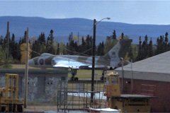 During a recent airline flight from England, we had to make an unplanned landing in Goose Bay (to pump out the toilet tanks). Fellow passenger Mike Dilkes snapped this Vulcan bomber out of the open door of our parked Airbus.