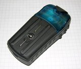 Two wire contacts installed on the <i>eTrex</i> battery cover connect the power supply to the internal battery.