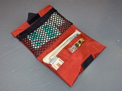 This camping first aid kit is compact and can be used separately from the survival kit.