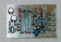 The resistors, diodes, and capacitors (except C8) have been installed.