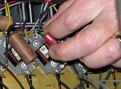 Bending and clipping the opposite lead before soldering.