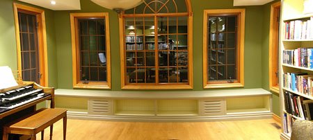 Completed window seat bookcase with integrated tone cabinets, awaiting books. You can get a feel for the rest of the room by looking at the reflections in the windows. Fisheye view created with AutoStitch.