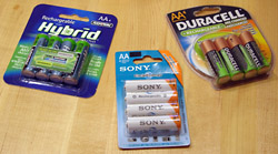 Three popular brands of pre-charged (low self-discharge) rechargeable NiMH AA batteries.