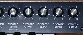 Tremolo depth (first VCA) and envelope attack, decay, and depth (second VCA) controls.