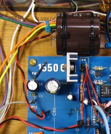 An off-board 5600µF capacitor eliminated the AC hum.