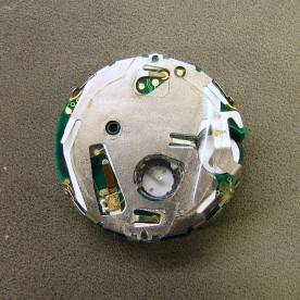 The movement with both batteries removed.