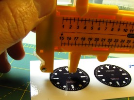 Using an inexpensive circle cutter to cut out a dial.