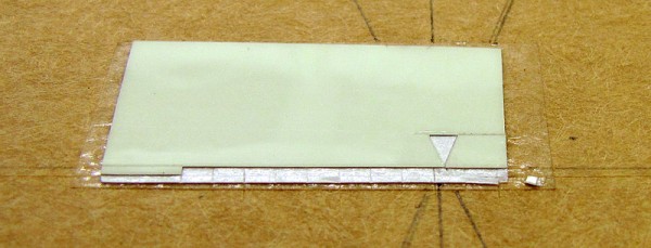 A small piece of Jessup #7550 lume tape from which I cut the indices for the "Evolution."