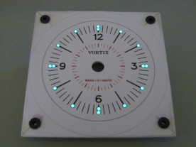 A low-light photo showing the luminous markers and sound isolation grommets.