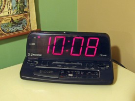 The large glowing digits of my old alarm clock were disturbing my sleep.