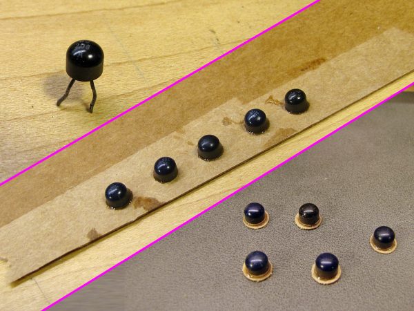 The buttons themselves were made from old transistors, epoxied to cardboard.