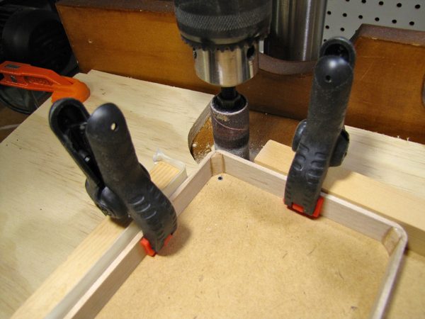 A pivot on this jig allowed me to sand the corners to a precise radius.