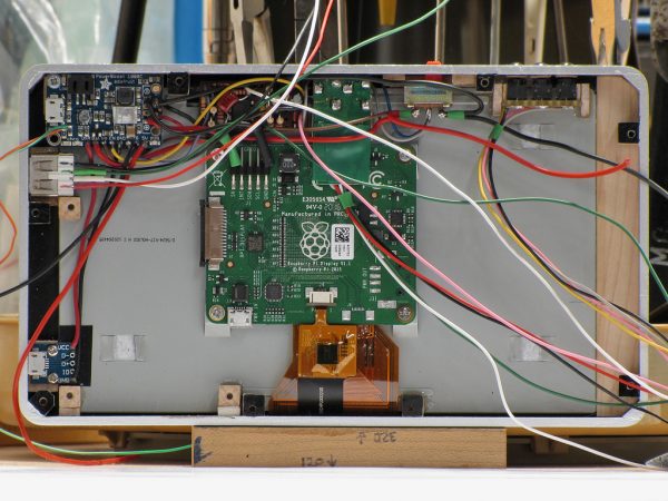 Completed wiring between the PowerBoost 1000C, shutdown controller and battery monitor, power switch, and charging port.