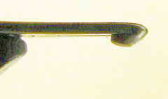 Contrast-enhanced side-view closeup of the rolled under nib. Click to enlarge.