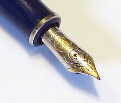 Closeup of the M605's rhodium plated 14K gold nib.