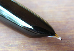Close-up of the hooded stainless steel fine nib.