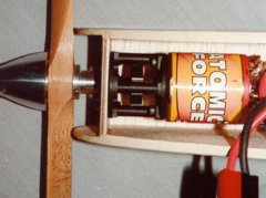 A Kysosho Atomic Force motor and Great Planes gearbox, bolted to the back of the firewall of my redesigned <i>Fred's Special</i>. The bottom front of the fuselage remains open, providing the motor, battery, and speed control with plenty of cooling.