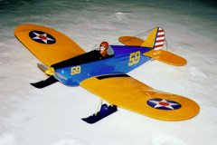 The Great Planes <i>SlowPoke</i> also flies well from skis.