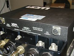 This is the 400A speed control used in the <i>E-Plane</i>. In addition to the connectors for the motor power leads, there is a plug for the Hall sensors, another to interface to the throttle control in the cockpit, and an inlet and outlet for liquid coolant. Photo by B. Miller.