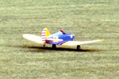 The tail comes off the ground almost immediately. With its forward-set wide-stance main gear, the <i>SlowPoke</i> had no tendency to nose over or ground loop.