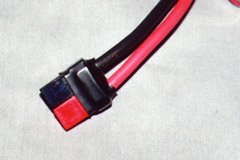 Sermos connectors can be shortened by about 3/16". This pair is covered in heat-shrink to protect against short-circuits.