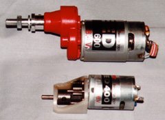 Two typical single stage gearboxes. At the top is a Master Airscrew gearbox for Speed 600 size motors, which comes in 2.5:1, 3:1, and 3.5:1 ratios, and features ball bearings on the output shaft. At the bottom is a Modelair-Tech GB-50 for Speed 400 size motors. This is a simple, low-cost gearbox with a 2.14:1 ratio, metal gears, and an easily replaceable 1/8" output shaft.