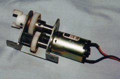 A two stage industrial gearbox. Although this particular gearbox wasn't designed for model aircraft use, the principle of operation is the same. I purchased several of these at a surplus store, and plan to adapt them for e-flight some day (by removing a lot of metal and using hollow shafts, all in the name of saving weight).