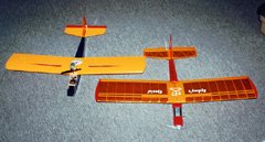 The recipe applies to small models too. These Speed 400 planes draw 10A from 7 cells (70W). Due to the low efficiency of both the motor and propeller, only about 35W of useful power is produced, but that's enough to fly both models well. The one on the left has 1.5 sq.ft of wing; the one on the right has 1.9 sq.ft. Both weigh about 18 oz.