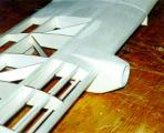 To make the LT-25 into a twin, I extended the leading edge sheeting by one rib bay, and attached nacelles made from 1/4 inch thick balsa. To make the LT-25 into a twin, I extended the leading edge sheeting by one rib bay, and attached nacelles made from 1/4 inch thick balsa.