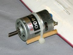 This Speed 400 motor is attached to the dowels with a nylon cable tie. The dowels are set directly into a glassed foam wing.