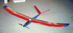 My Spectra after I re-engineered it with a V-tail, lighter structure, a Master Airscrew gearbox, and a 12x8 folding propeller.