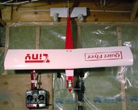My always-ready-to-fly hangar (or should that be "hanger"). The radio is plugged into a timer controlled charger too. My always-ready-to-fly hangar (or should that be "hanger"). The radio is plugged into a timer controlled charger too.