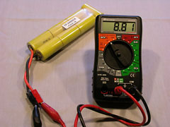 This partially charged 7-cell NiCd battery reads 8.81V, which corresponds to 1.26V per cell. Under load, this voltage would be lower, perhaps 7.7V.