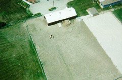 A view of our barn from about 500ft. You can see three Norwegian Fjord horses just below the barn there.