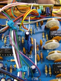 A bundle of wires connects the filter to the main board.