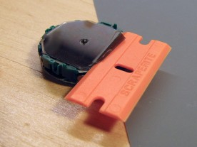 I removed the original polarizer using a plastic razor blade.