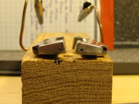 Original (left) and modified (right) end link, bottom side up.