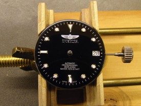 With the hands removed, the dial can just be lifted off.