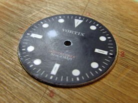 The low spot is even more apparent after preliminary sanding with 2000 grit sandpaper.