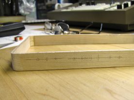 The centre of each hole was carefully marked.