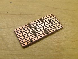I built the battery monitor on a small (1.3x0.6" or 33x15mm) piece of stripboard.